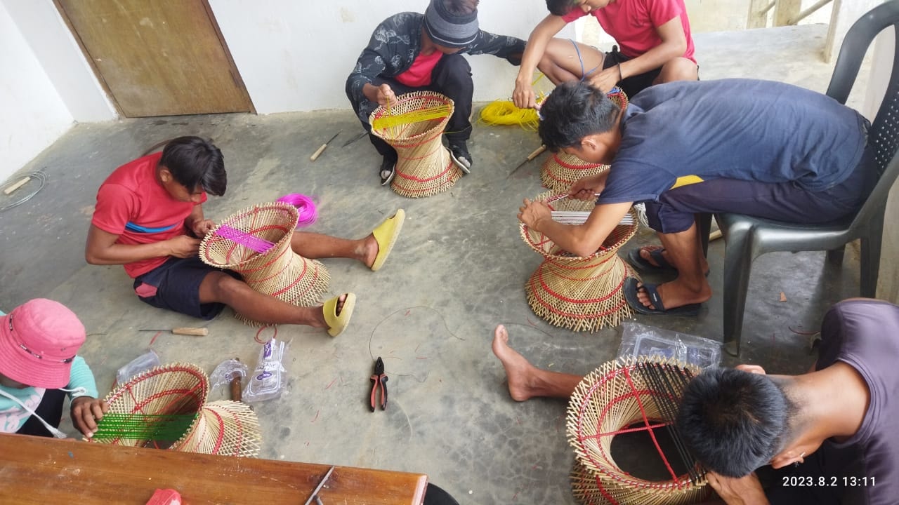 Skill development training on traditional stool at Tobu Village, Tuensang district