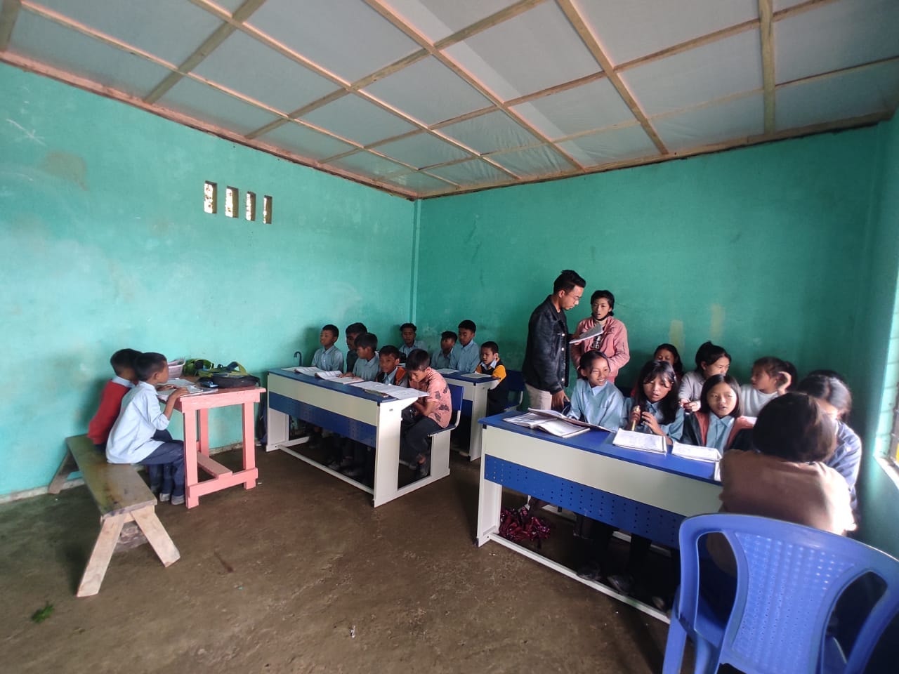 Volunteer mentor Mr. Tomugha during remedial class at GMS Amiphoto