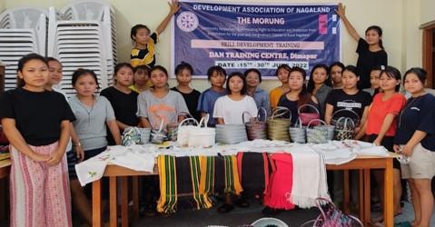 Trainees pose for group photo with finished products at DAN Training Centre, Dimapur