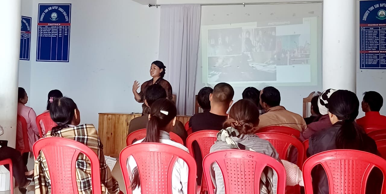 Ms. Regina Kithan presenting project achievements at half-yearly synergy workshop, Zunheboto