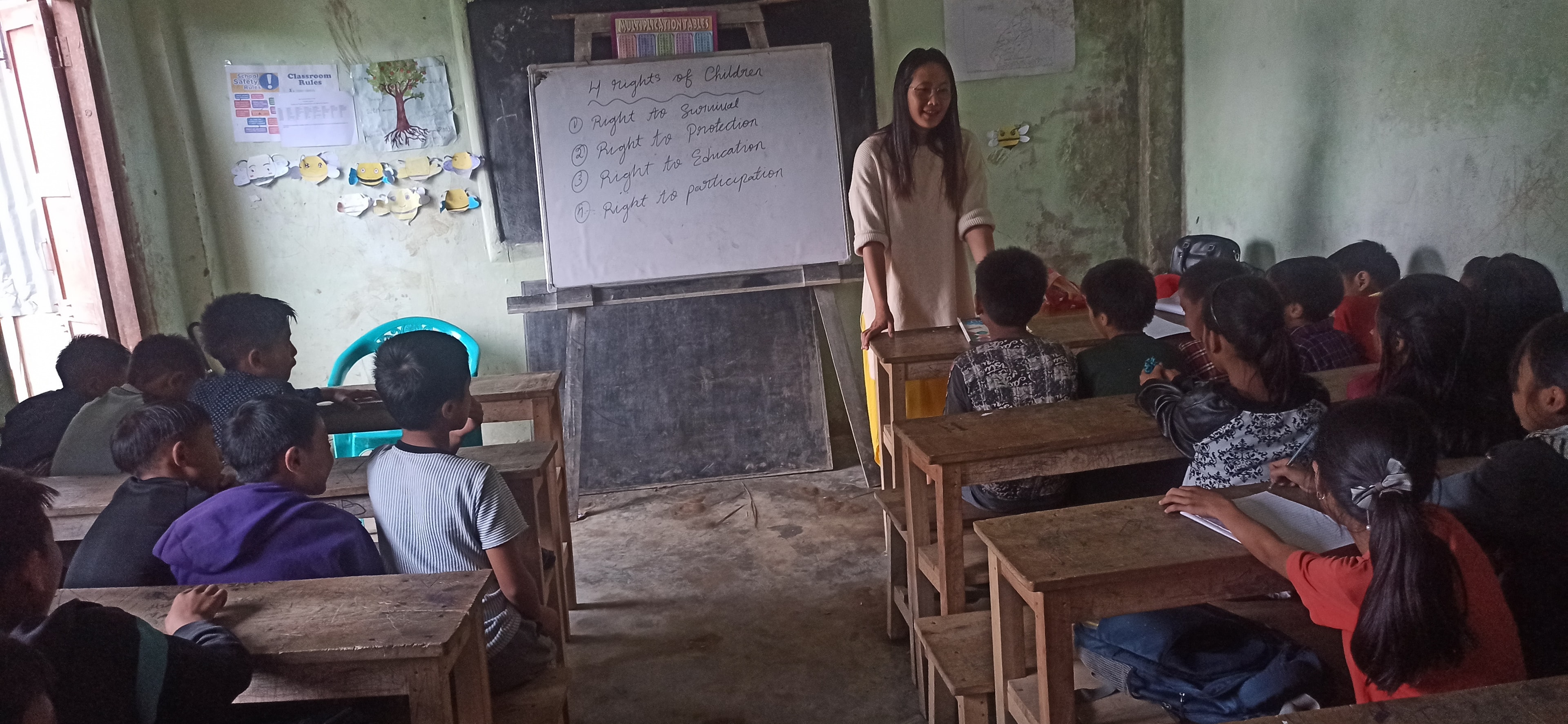 Ms. Benjonglemla RC monitoring remedial class at Old Medical, Tuensang
